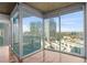 Living room featuring hardwood floors, and floor to ceiling windows with beautiful city views at 3324 Peachtree Ne Rd # 1718, Atlanta, GA 30326