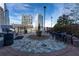 Outdoor grilling area with barbecue, counter space and several tables for dining at 3324 Peachtree Ne Rd # 1718, Atlanta, GA 30326