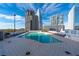 Beautiful rooftop pool with city views and ample lounge seating at 3324 Peachtree Ne Rd # 1718, Atlanta, GA 30326