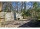 Backyard deck featuring lattice privacy fencing and two potted plants at , Atlanta, GA 30329