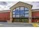 Exterior view of the entrance of a Kroger store with blue signage and shopping carts at , Atlanta, GA 30329