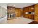 Cozy living room area featuring a brick fireplace and wood paneled walls at , Atlanta, GA 30329