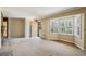 Spacious living room with large windows providing natural light and access to the exterior at , Atlanta, GA 30329