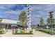 Exterior view of Toco Hill shops with outdoor seating on a bright day at , Atlanta, GA 30329