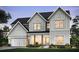Charming two-story home with white siding, black roof, wooden pillars, and a well-manicured lawn at 292 Rockledge Sw Bnd, Powder Springs, GA 30127