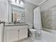 Bathroom featuring a vanity with granite countertops, a toilet, and a shower-tub combination at 301 Cochin Dr, Woodstock, GA 30188