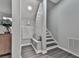 Entry hallway with stairs and landing at 301 Cochin Dr, Woodstock, GA 30188