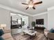 Open concept living room view into the main bedroom with ensuite bath at 301 Cochin Dr, Woodstock, GA 30188