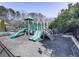 Community playground with slides, stairs, and other play equipment, creating a fun and safe environment for children at 301 Cochin Dr, Woodstock, GA 30188