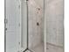 Tile shower with glass doors and chrome fixtures at 301 Cochin Dr, Woodstock, GA 30188