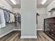 Walk-in closet with hanging racks and built-in storage at 301 Cochin Dr, Woodstock, GA 30188