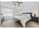 Bright main bedroom featuring ensuite bath and stylish accents at 3071 Balearic Se Dr, Marietta, GA 30067