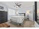 Cozy bedroom with contemporary decor, neutral color palette, and updated ceiling fan at 3071 Balearic Se Dr, Marietta, GA 30067