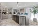 Bright kitchen with an island, stainless steel appliances, and ample cabinet space at 3071 Balearic Se Dr, Marietta, GA 30067