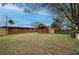 Open backyard featuring a shed and new fences, offering a blend of space and updated fencing at 429 Old Tennessee Ne Hwy, White, GA 30184