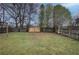 Expansive backyard with new wooden fence, blending privacy with an inviting outdoor space at 429 Old Tennessee Ne Hwy, White, GA 30184