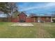 Spacious backyard featuring a shed, concrete area and new privacy fencing, offering space and seclusion at 429 Old Tennessee Ne Hwy, White, GA 30184