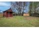 Large backyard with small shed and freshly installed wooden fence, offering privacy and space at 429 Old Tennessee Ne Hwy, White, GA 30184