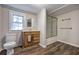 Bathroom featuring wood-look floors, a bathtub, and a vanity at 429 Old Tennessee Ne Hwy, White, GA 30184