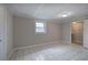 Bedroom with a window and a closet featuring wire shelving at 429 Old Tennessee Ne Hwy, White, GA 30184