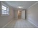 Bedroom with a window and an open closet featuring wire shelving at 429 Old Tennessee Ne Hwy, White, GA 30184