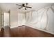 Bedroom with hardwood floors, closet and stylish accent wall at 5498 Stoneybrook Se Ct, Mableton, GA 30126