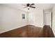 Light bedroom featuring hardwood floors, closet and ceiling fan at 5498 Stoneybrook Se Ct, Mableton, GA 30126