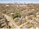 Aerial view of the home with neighborhood and city skyline in the distance at 1118 Glenwood Se Ave, Atlanta, GA 30316