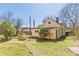 Inviting backyard with a well-maintained lawn and a charming pergola-covered deck, perfect for outdoor relaxation and entertaining at 1118 Glenwood Se Ave, Atlanta, GA 30316