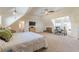 Bright bedroom with a ceiling fan, large windows, and dedicated desk space at 1118 Glenwood Se Ave, Atlanta, GA 30316
