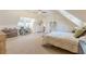 Spacious bedroom featuring neutral decor, a ceiling fan, and a dedicated workspace for ultimate comfort and productivity at 1118 Glenwood Se Ave, Atlanta, GA 30316