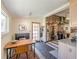 Open kitchen and dining area, featuring stainless steel appliances and a unique stone floor at 1118 Glenwood Se Ave, Atlanta, GA 30316