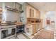 Well-equipped kitchen with stainless steel appliances, tile floors, and ample counter space at 1118 Glenwood Se Ave, Atlanta, GA 30316