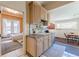 Kitchen featuring warm wood cabinets adjacent to a bathroom at 1118 Glenwood Se Ave, Atlanta, GA 30316