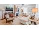 Cozy living room with hardwood floors, fireplace, and a comfortable white sectional sofa at 1118 Glenwood Se Ave, Atlanta, GA 30316
