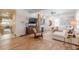 Bright living room with hardwood floors, fireplace, and seamless flow to the kitchen at 1118 Glenwood Se Ave, Atlanta, GA 30316