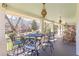 Inviting porch with wrought iron furniture and hanging lanterns, perfect for relaxing outdoors at 1118 Glenwood Se Ave, Atlanta, GA 30316