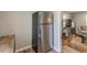 Stainless steel refrigerator with hardwood floors and view of living room in the background at 1118 Glenwood Se Ave, Atlanta, GA 30316
