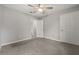 Bedroom featuring neutral walls, carpet flooring, a ceiling fan and a closet at 144 Grayland Hills Ct, Lawrenceville, GA 30046