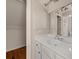 Bathroom featuring a vanity with a sink, mirror, and storage cabinets at 3287 Belmont Glen Se Dr, Marietta, GA 30067