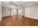 Bedroom with tray ceiling, double doors and hardwood floors at 3287 Belmont Glen Se Dr, Marietta, GA 30067