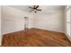 Bedroom featuring hardwood floors, neutral walls, and a ceiling fan at 3287 Belmont Glen Se Dr, Marietta, GA 30067