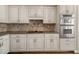 Close up of the kitchen featuring white cabinets, stainless steel appliances, and granite countertops at 3287 Belmont Glen Se Dr, Marietta, GA 30067