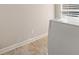 Laundry room with tile floors and a white washer at 3287 Belmont Glen Se Dr, Marietta, GA 30067