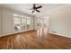 Living room with hardwood floors, shutters, and views to the backyard at 3287 Belmont Glen Se Dr, Marietta, GA 30067