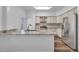 Kitchen with granite counters, stainless steel appliances, and ample cabinet space at 1868 Appaloosa Mill Ct, Buford, GA 30519