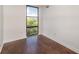 Bright bedroom features hardwood floors and a large window with city views at 375 Ralph Mcgill Ne Blvd # 807, Atlanta, GA 30312
