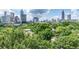 View of downtown skyline and lush green canopy at 375 Ralph Mcgill Ne Blvd # 807, Atlanta, GA 30312
