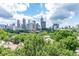 View of the city skyline over treetops at 375 Ralph Mcgill Ne Blvd # 807, Atlanta, GA 30312
