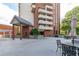 Exterior view of patio area, showcasing the building's architecture and outdoor seating at 375 Ralph Mcgill Ne Blvd # 807, Atlanta, GA 30312